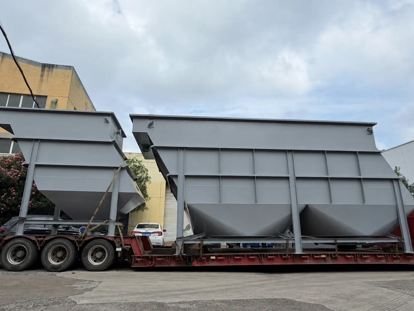 Gray lamella clarifiers loaded for transport