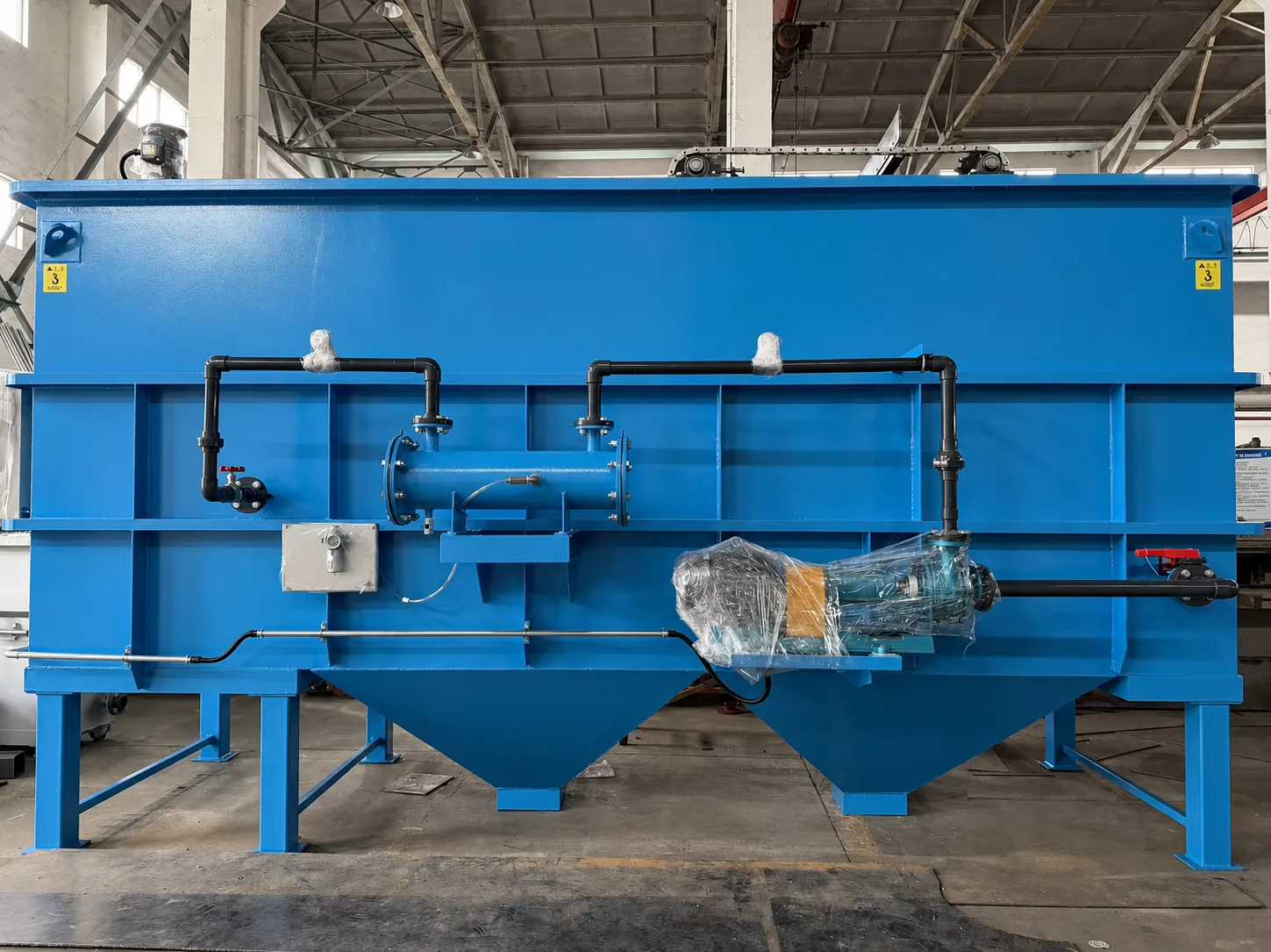 Blue clarifier tank with supporting pipework